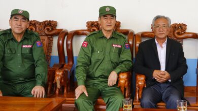 Peng Daxun, MNDAA commander (centre) (MNDAA)
