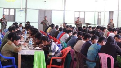 Junta soldiers captured by the AA are pictured eating in the armed group’s custody on March 4, 2024 (AA Info Desk)