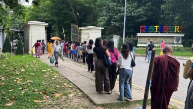Korean Language test takers wait in line to register for an exam in Yangon in 2023 (Photo: CJ)