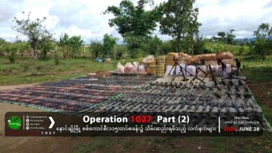 Stockpile of weapons seized by the TNLA and its allies from the captured Light Infantry Battalion 115 base on June 26. (Photo: TNLA Information Team)