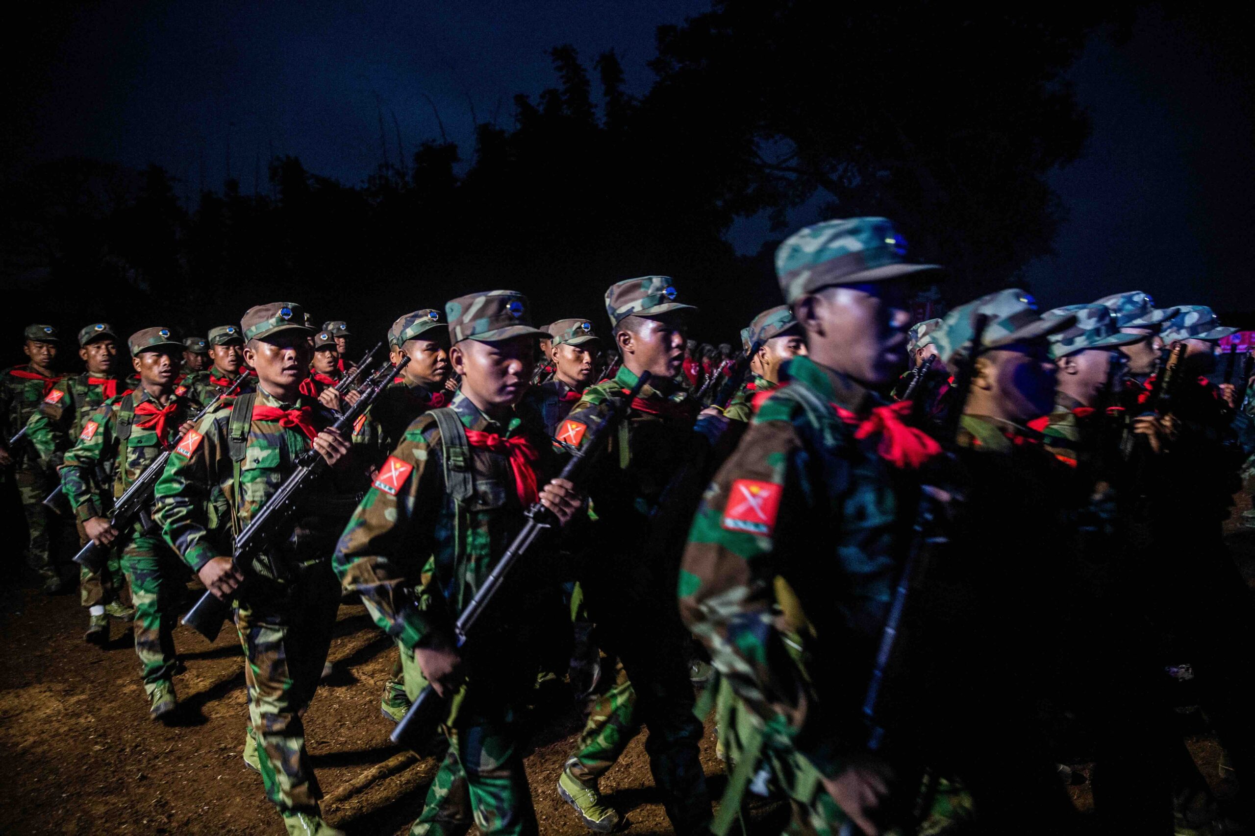 Soldiers from the Ta'ang National Liberation Army parade as they mark the 59th anniversary of the Ta'ang National Resistance Day on January 12, 2022 (Photo: AFP)