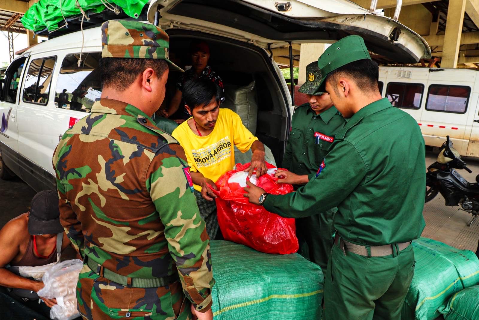 Brotherhood Alliance troops inspect the Muse 105-Mile Trade Zone, seized earlier this year. (Photo: Myanmar Now)