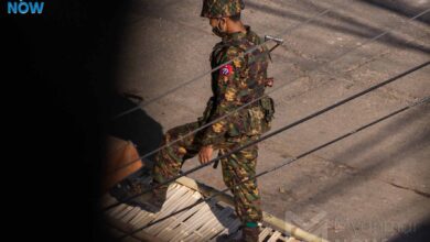 Junta soldier armed with a rifle during anti-coup protests in Yangon in 2021 (Photo: Myanmar Now)