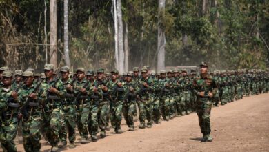 TNLA fighters training in a forest in northern Shan State in March 2023 (Photo - AFP)