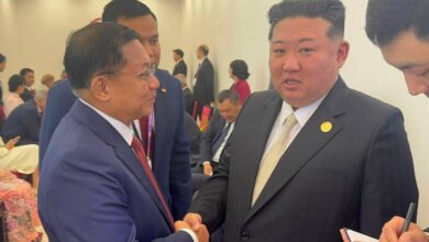 Myanmar junta leader Min Aung Hlaing (left) shakes hands with North Korean leader Kim Jong Un in Beijing on September 2 (Photo: Telegram)