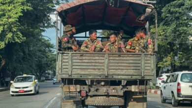Soldiers patrol on a truck in Yangon in December 2023 (Photo: AFP)