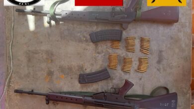 Resistance forces display rifles and ammunition seized from junta troops. (Photo: KLG-PDF)