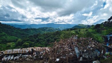 Buildings lie devastated in a Ta’ang National Liberation Army–controlled area of northern Shan State, where junta airstrikes have killed dozens of people since early October, 2025. (Photo: Ta’ang National Liberation Army)