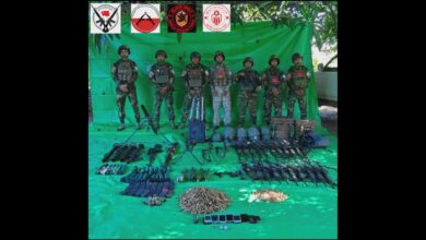 PDF troops pose with weapons and ammunition seized by resistance forces in the village of Ponnar, in Sagaing Region’s Wetlet Township, on November 23 (Photo: Nway Oo Aung Pwe)