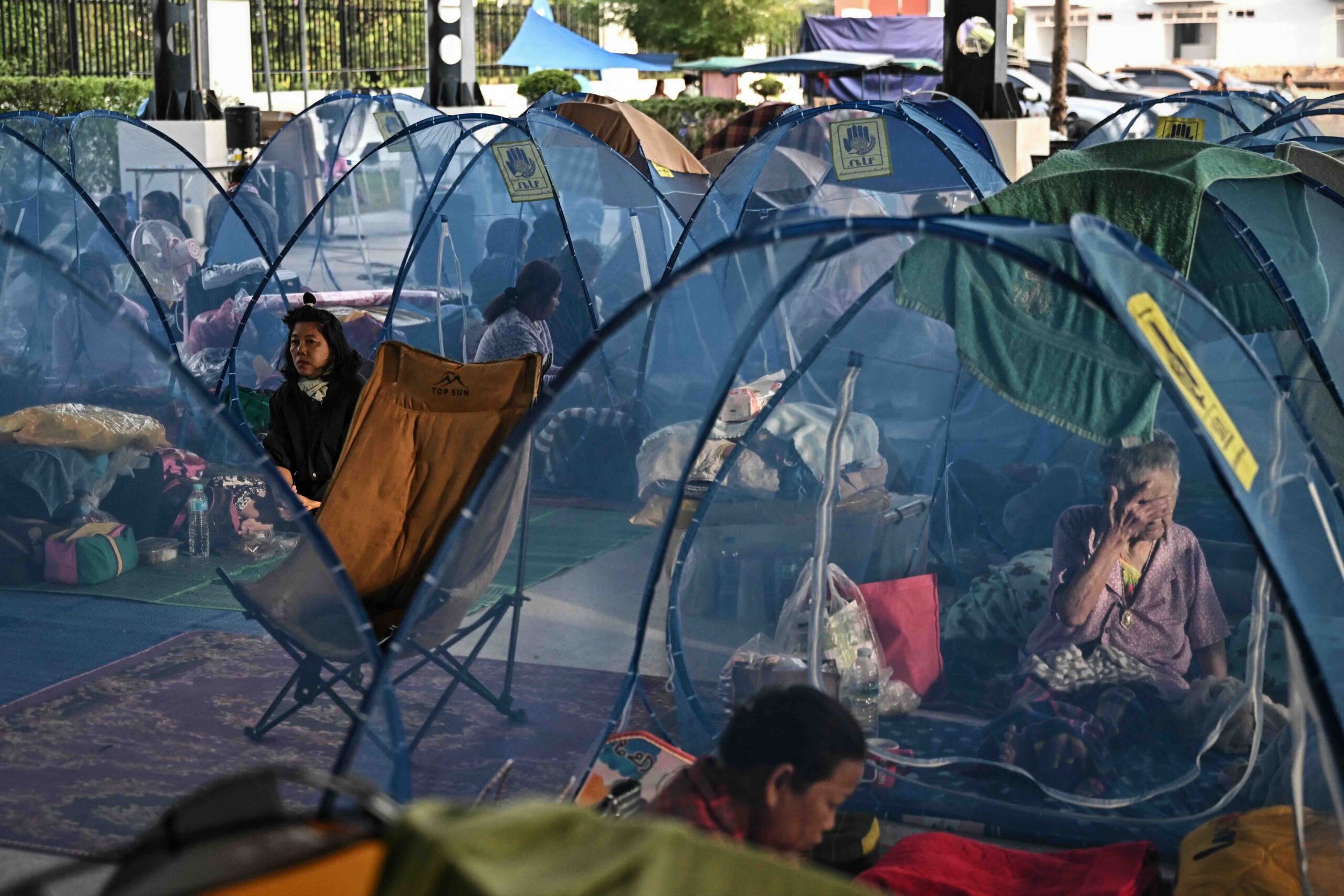 Displaced residents take shelter at an evacuee center during clashes along the Thailand-Cambodia border in Thailand's Sa Kaeo Province on December 10. Fighting between Thailand and Cambodia spread on December 9, forcing a mass exodus of civilians as the renewed hostilities derailed a US-brokered truce (Photo: AFP)