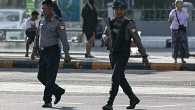 Regime police seen in Yangon on December 28, 2025 (Photo: AFP)