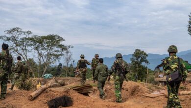 KIA fighters, personnel, and officers inspect a Myanmar military camp seized by the KIA on October 20, 2024, in Waingmaw Township, Kachin State. (Photo: Gen Gun Maw / Facebook)