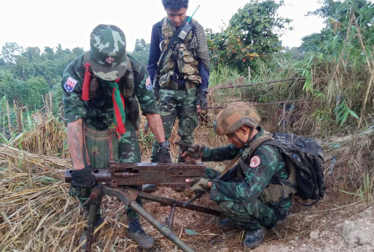 Anti-regime forces examine weapons seized during a successful offensive carried out in Karen State’s Hpapun Township in December 2024 (Photo: BPLA)
