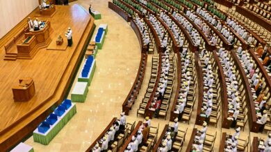 Members of Myanmar’s parliament leave after a session of the Pyithu Hluttaw (House of Representatives) in Naypyitaw on March 16 (Photo: AFP)