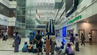 Family members see off overseas workers departing from Yangon International Airport (Photo: Myanmar Now)