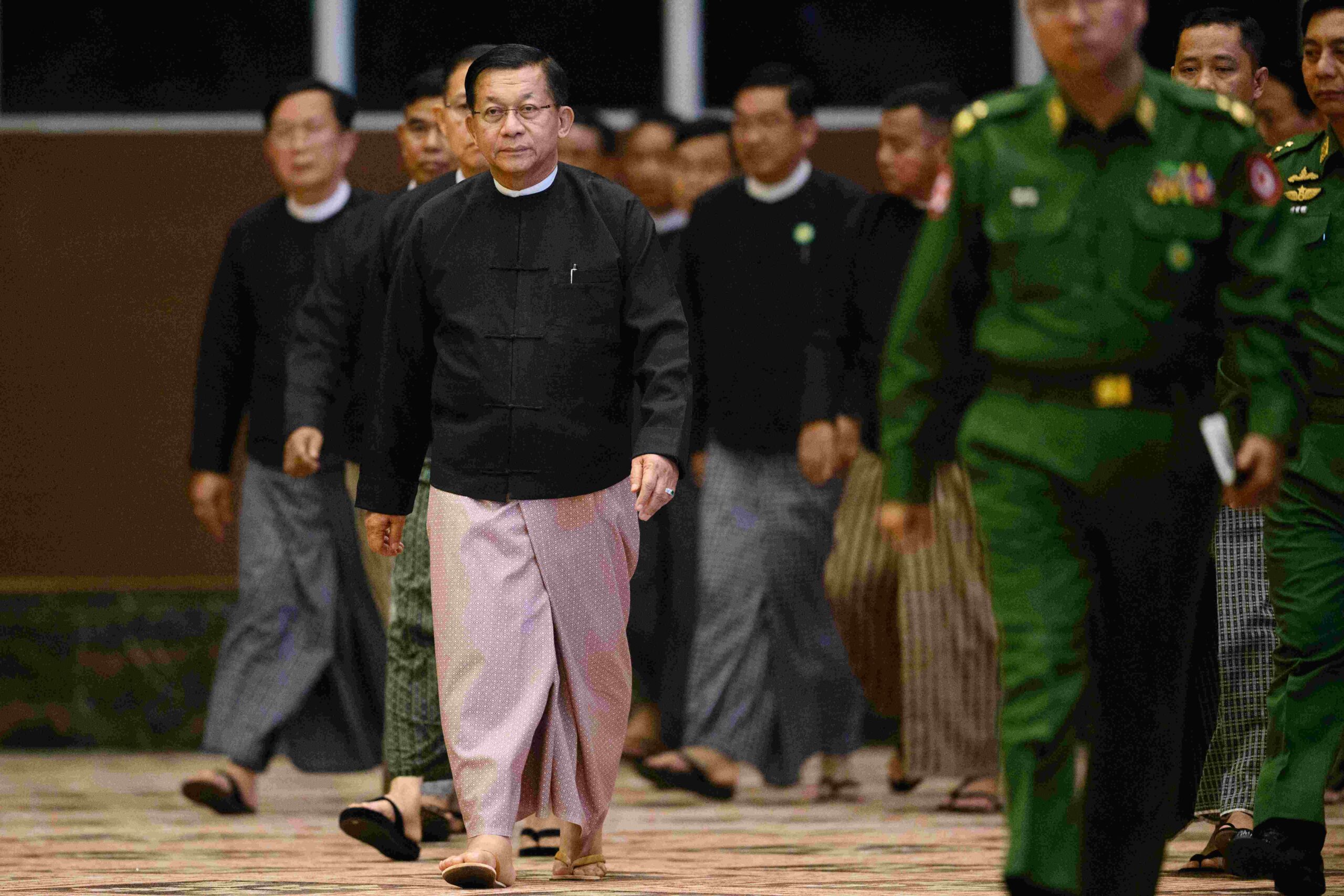 Junta chief Min Aung Hlaing arrives for an event in Naypyitaw on March 28 (Photo: Anthony Wallace / AFP)
