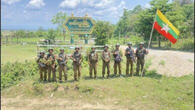Junta soldiers pose after seizing control of Maw Luu on May 5 (Photo: Pro-regime social media accounts)