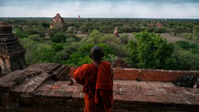 A monk looks at ancient pagodas in Bagan in January 2019 (Photo: AFP)