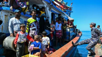 A boat loaded with dozens of Rohingya refugees is seen off the coast of Labuhan Haji in Southern Aceh province on October 21, 2024 (Photo: Chaideer Mahyuddin / AFP)