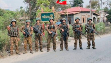 Junta troops pose after taking control of Indaw, in northern Sagaing Region, on April 30 (Photo: Pro-regime social media accounts)