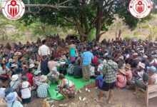The NUG distributes aid among displaced residents of Bago Region’s Nattalin Township in May of this year (Photo: PDF Operational Command 22)