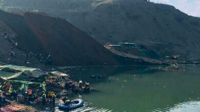Rescue workers prepare to search for missing people after a landslide at a jade mine in Hpakant in December 2021 (Photo: AFP)