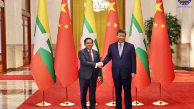 Min Aung Hlaing, left, shakes hands with China’s President Xi Jinping at the Great Hall of the People in Beijing on June 16 (Photo: AFP)