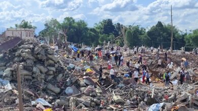 Residents and rescue workers comb the wreckage of the massive blast that killed at least 39 people in northern Shan State’s Namkham Township on May 31 (Photo: Palaung Land)
