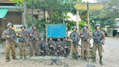 Junta troops pose after recapturing the villages of Meza and Nant Thea, about 10 miles south of Indaw, on July 4 (Photo: CINCDS)