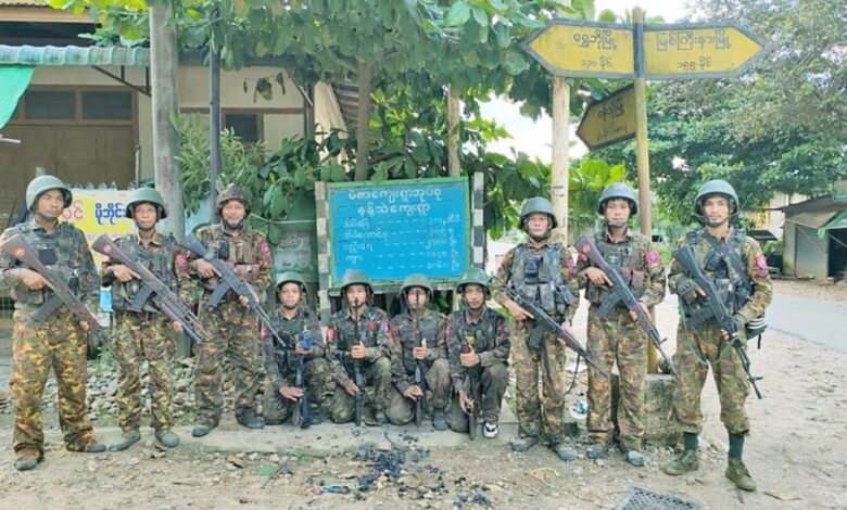 Junta troops pose after recapturing the villages of Meza and Nant Thea, about 10 miles south of Indaw, on July 4 (Photo: CINCDS)