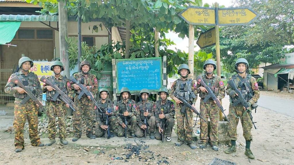 Junta troops pose after recapturing the villages of Meza and Nant Thea, about 10 miles south of Indaw, on July 4 (Photo: CINCDS)