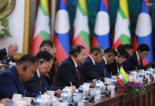 Myanmar junta chief Min Aung Hlaing attends a meeting with Lao President Thongloun Sisoulith at the Presidential Palace in Vientiane on July 3 (Photo: AFP)