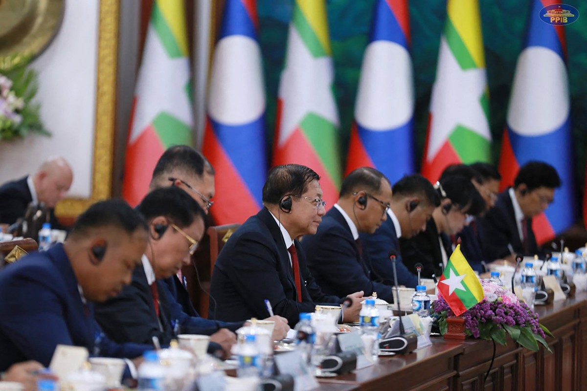 Myanmar junta chief Min Aung Hlaing attends a meeting with Lao President Thongloun Sisoulith at the Presidential Palace in Vientiane on July 3 (Photo: AFP)