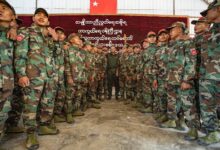 NUG Defence Minister Yee Mon, centre, stands with PDF fighters at a military training graduation ceremony held in the NUG’s Military Region 1 in April 2024 (Photo: Supplied)