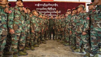 NUG Defence Minister Yee Mon, centre, stands with PDF fighters at a military training graduation ceremony held in the NUG’s Military Region 1 in April 2024 (Photo: Supplied)