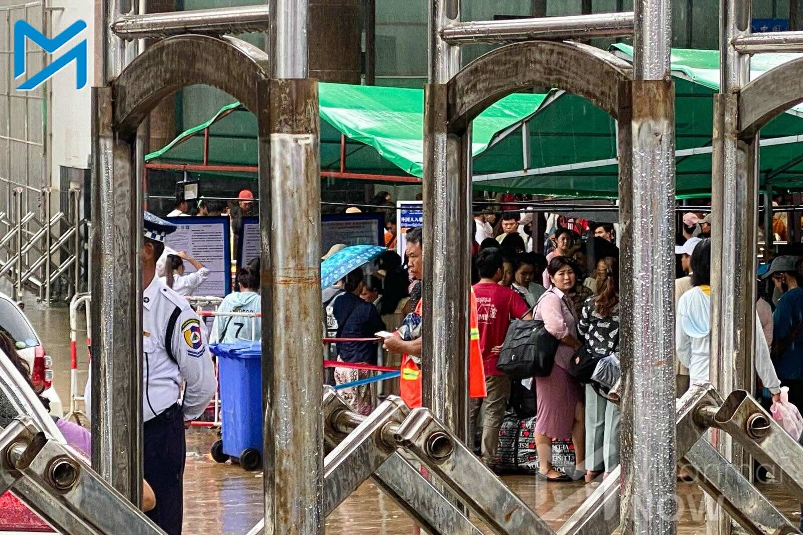 Myanmar nationals wait to cross into China at the Muse–Ruili border gate in September 2023. (Photo: Myanmar Now)