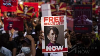 A protester holds a placard demanding the release of Aung San Suu Kyi during an anti-coup demonstration in Yangon on February 15, 2021 (Photo: Myanmar Now)