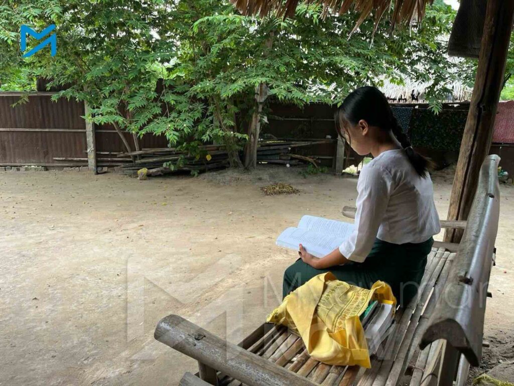 Her parents gone, a Myanmar student prays for the return of a father lost in conflict