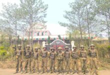Junta troops pose in front of Surbung Airport in Chin State’s Falam Township shortly after capturing it in April (Photo: Junta propaganda)