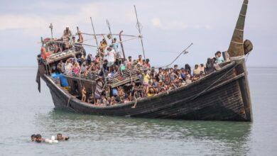 A boat carrying Rohingya refugees is stranded after reaching the coast of Indonesia’s Aceh Province in November 2023 (Photo: Amanda Jufrian / AFP)