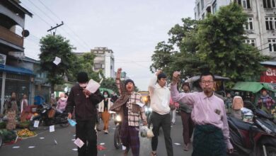 Protesters call for a boycott of the Myanmar military’s planned election near Mandalay’s Zegyo Market on December 3, 2025 (Photo: Supplied)