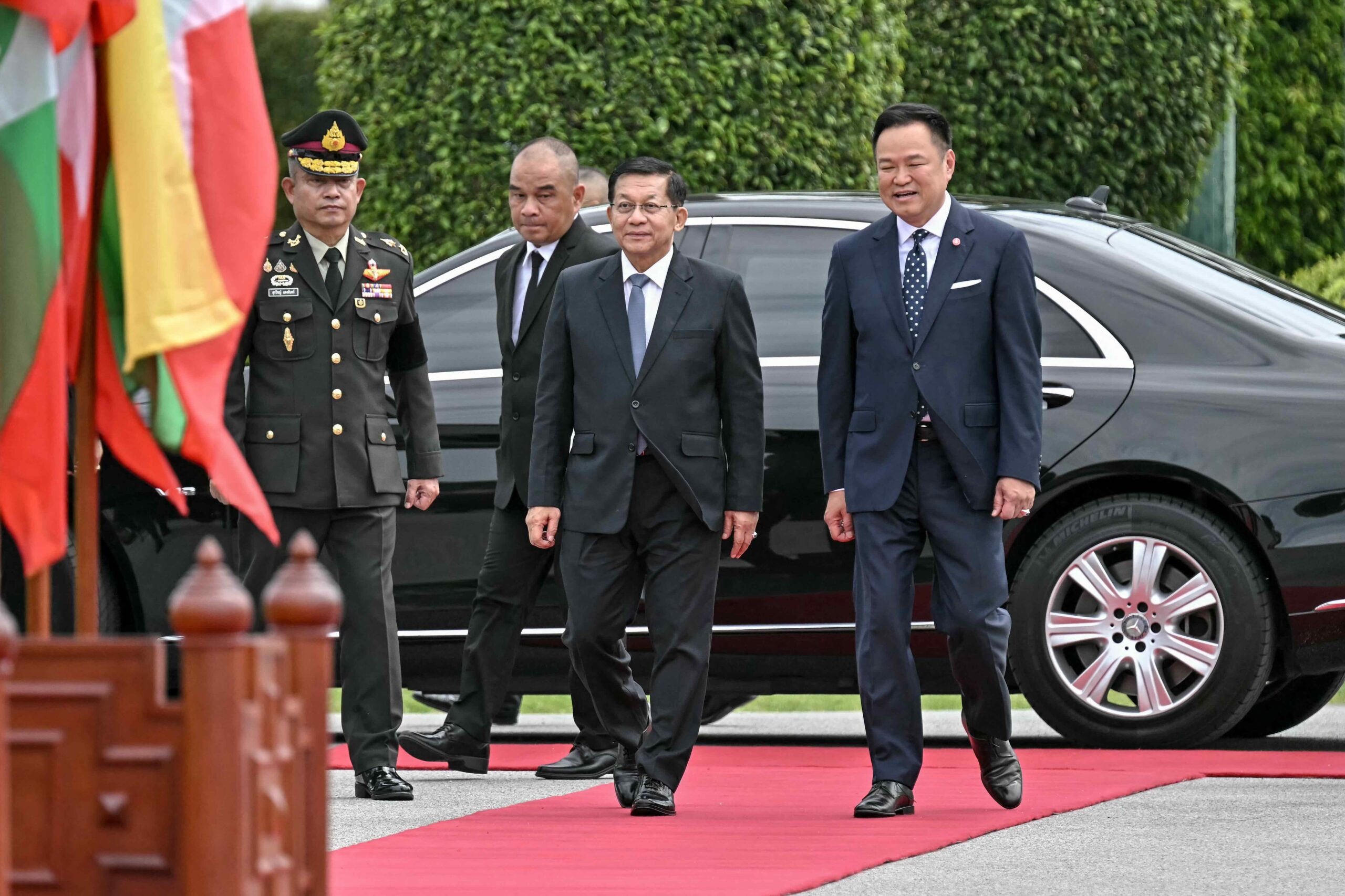 Myanmar junta leader Min Aung Hlaing is welcomed by Thailand's Prime Minister Anutin Charnvirakul at Government House in Bangkok during his visit to Thailand on August 6, 2026. (Photo: Lillian Suwanrumpha/AFP)