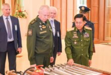 Min Aung Hlaing and Russia’s deputy defence minister Col.-Gen. Aleksandr Fomin examine items allegedly used by resistance forces in 2021 (Photo: Myanmar state media)