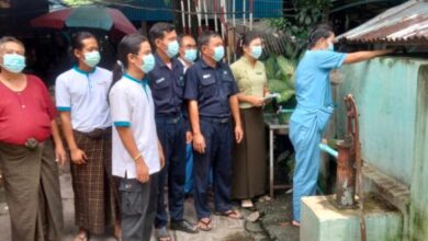 Health officers in Yangon add chlorine to water during a cholera outbreak in 2024 (Photo: supplied)