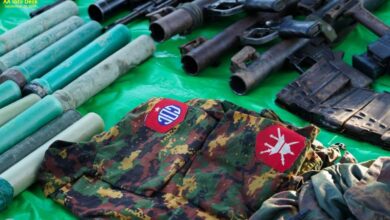 Weapons, ammunition, and some junta troops' uniforms bearing Light Infantry Division 101 badges seized during the Min Chaung Bridge battle (Photo: AA)