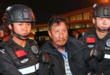 Wei Huairen, one of three people sentenced to death by a Chinese court on October 13, is seen being handed over to Chinese authorities in January 2025 (Photo: Xinhua)
